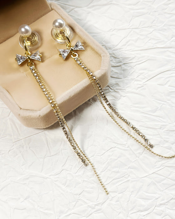 Lumina Bow | Pearl Bowknot Long Tassel Clip-On Earrings in Gold